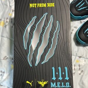 Brand New Puma LaMelo Adult Men Black and Blue basketball shoes.